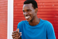 International student Omer is laughing