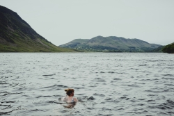 Woman swimming in a lake