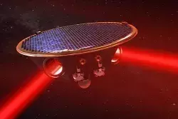 Lasers fired between the satellites, shown in this artist's concept, will measure how gravitational waves alter their relative distances.