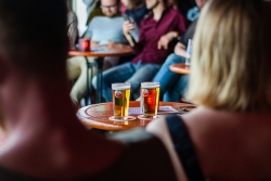 unsplash image people in pub with pints