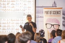 Expert speaking at a pub for pint of science festival