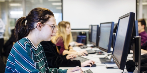 Female University of Portsmouth student working in computer lab