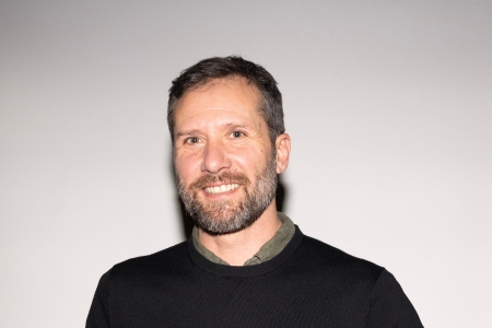 Man holding a certificate 