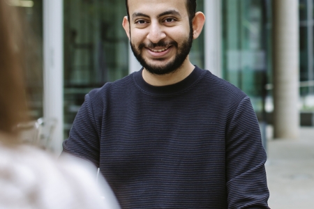 Hasan Altooq smiling at the camera