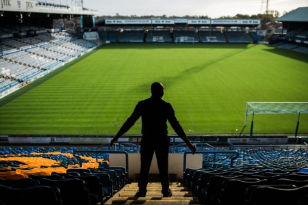 Vincent Pericard looking at the pitch at Portsmouth FC from the stands